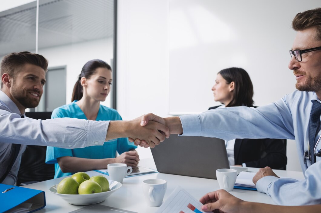 doctors-shaking-hands-with-each-other_107420-84800